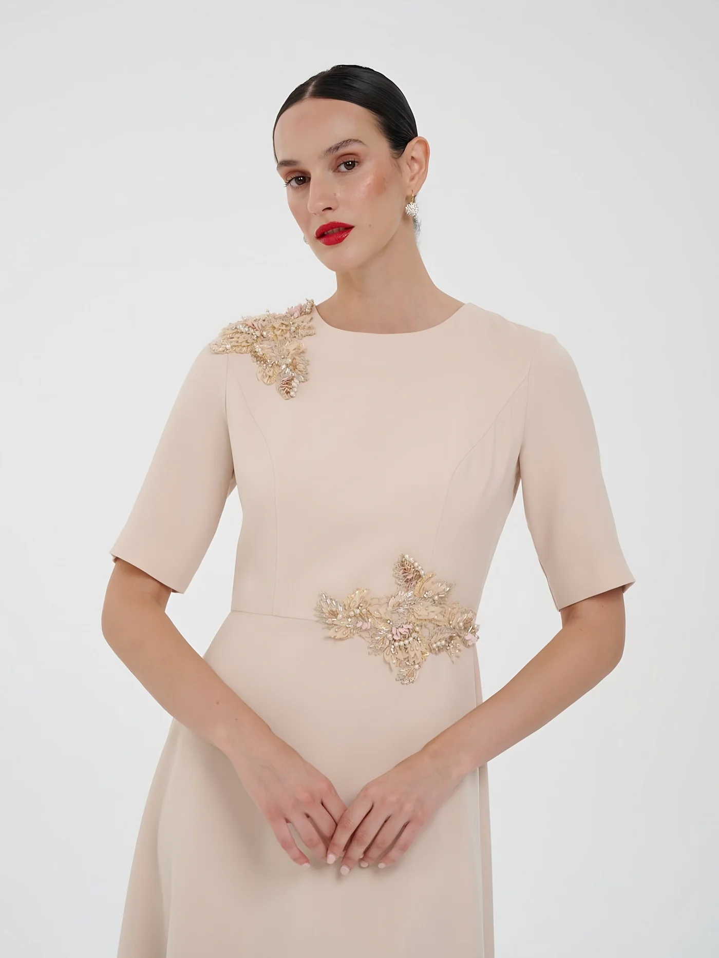 Jewel-Neck Cream Gown — model wearing · 2/3